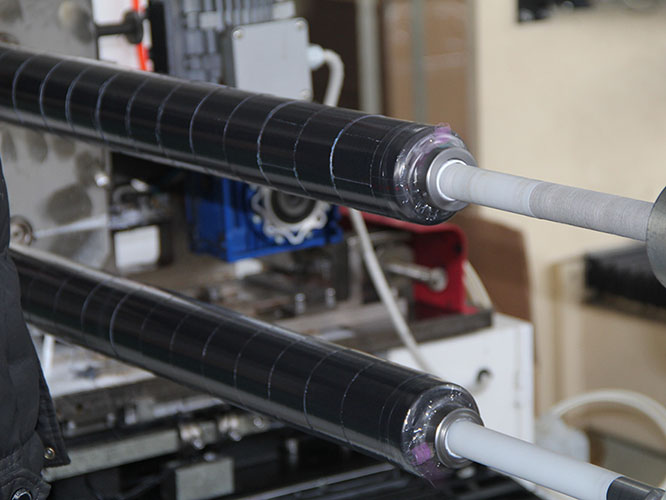 OEM kinesiology tape jumbo rolls in production facility